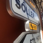 At the end of a long mountain loop, this sign signifies just one climb to go before an evening cerveza